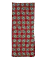 A flat view of 'The Morne' polyester, mosaic scarf. Clearly showing the intricate circle and square patterns on a rich red ground.