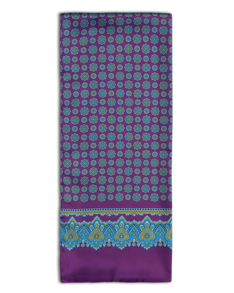 'The Beak' geometric purple polyester scarf arranged in a rectangular shape, clearly showing the multi-coloured fabric.