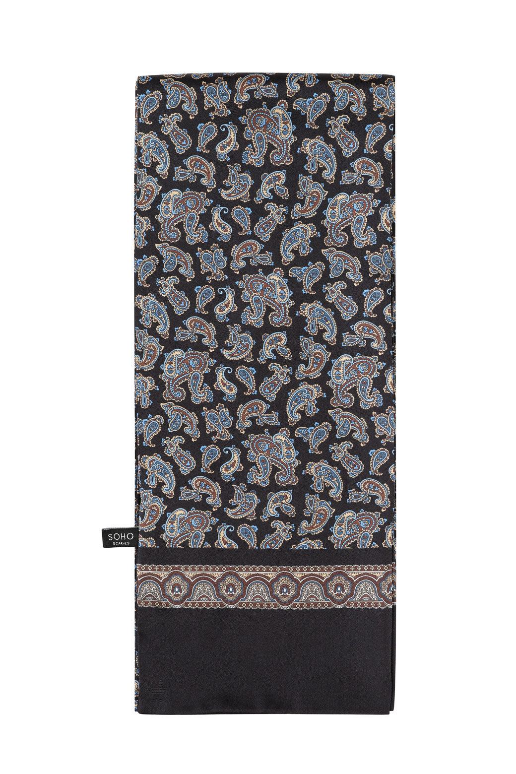 'The Dylan' paisley silk scarf arranged in a rectangular shape, showing the blue, red and cream paisley patterns on a black ground.