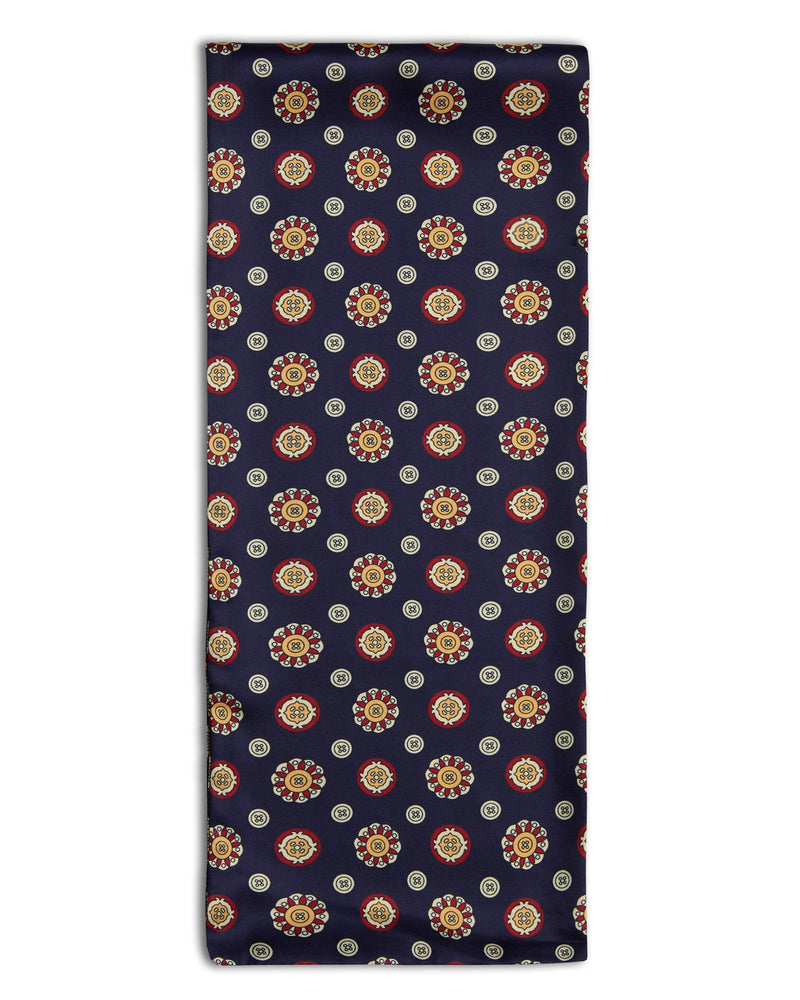'The Germain' geometric polyester scarf arranged in a rectangular shape, clearly showing the multi-coloured fabric.