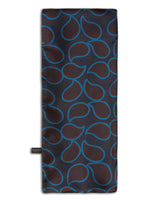 'The Kent' navy blue, wool-backed scarf arranged in a rectangular shape, clearly showing the minimal, stylised paisley patterns in maroon and pale blue, and the 'Soho Scarves' label on the left edge.