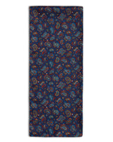 'The Lexington' polyester scarf arranged in a rectangular shape, clearly showing the deep blue coloured fabric and small paisley patterns.