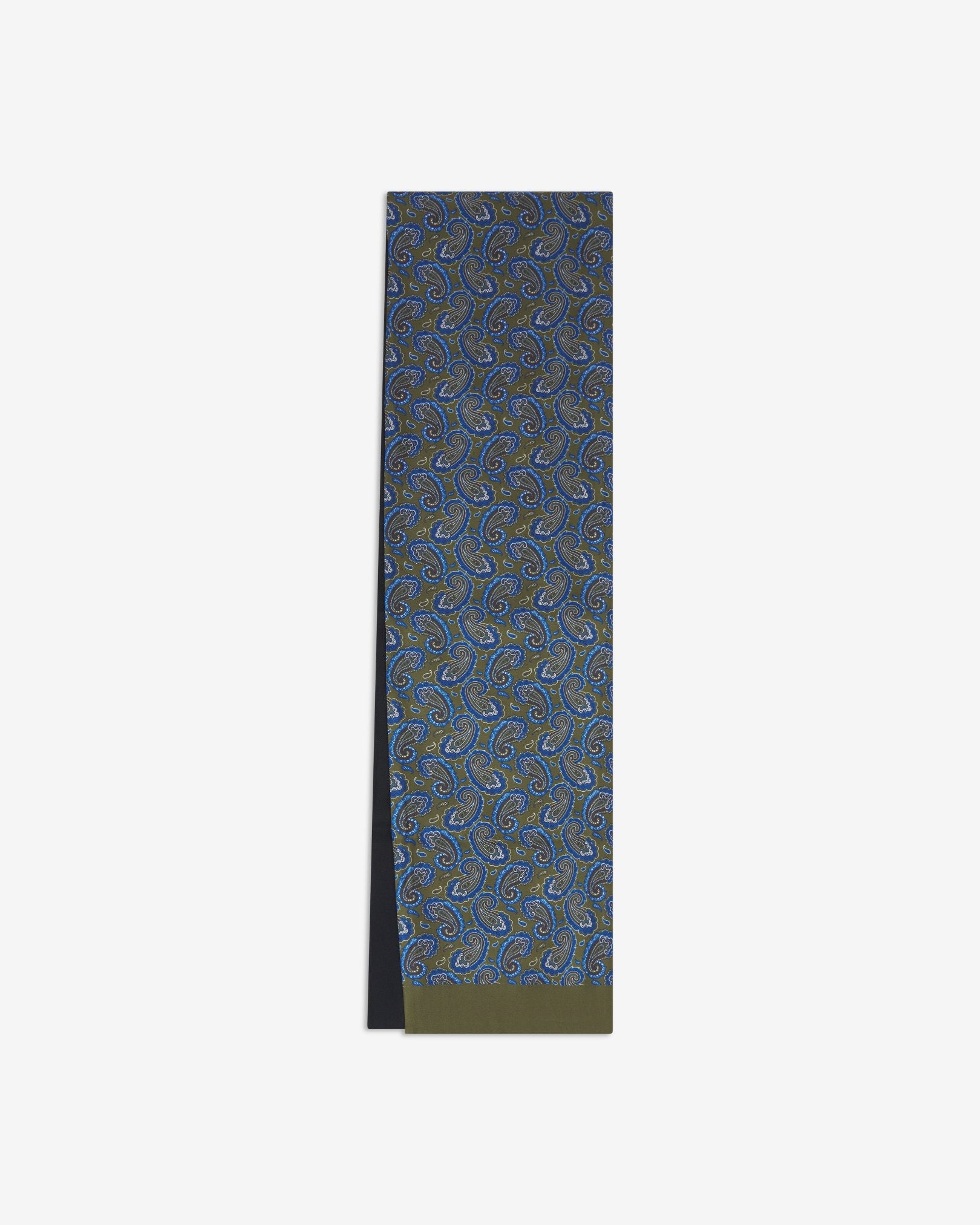 The Malibu dress scarf arranged in a rectangular shape with a focus on the blue and green paisley patterns against a black background and the fine woollen underside.