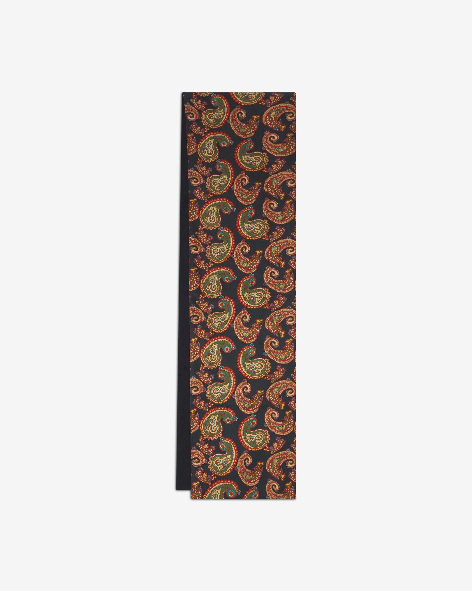 The Portland dress scarf arranged in a rectangular shape with a focus on the multi-coloured paisley patterns against a black background and the dark woollen underside.