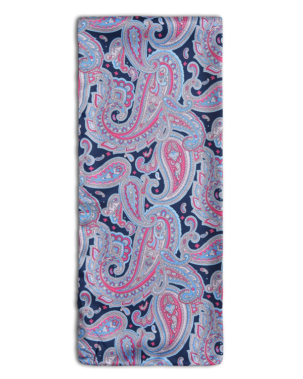 'The Shibuya' paisley-inspired polyester scarf arranged in a rectangular shape, clearly showing navy blue fabric with salmon pink, fuchsia and powder blue paisley patterns and the 'Soho Scarves' label on the left edge.