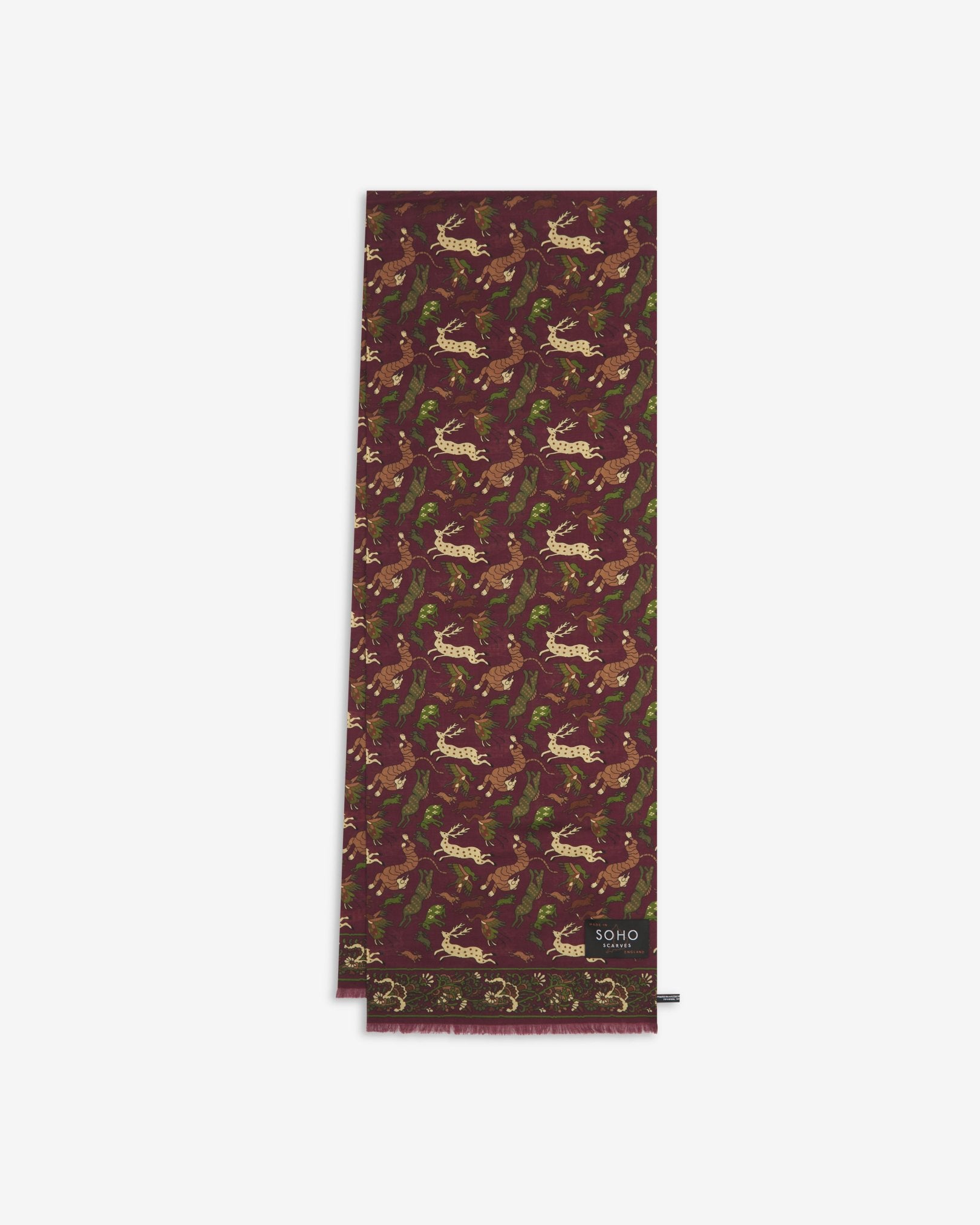 English-made silk and wool scarf arranged in a rectangular shape, displaying the repeating multicoloured animals in a range of autumnal tones.