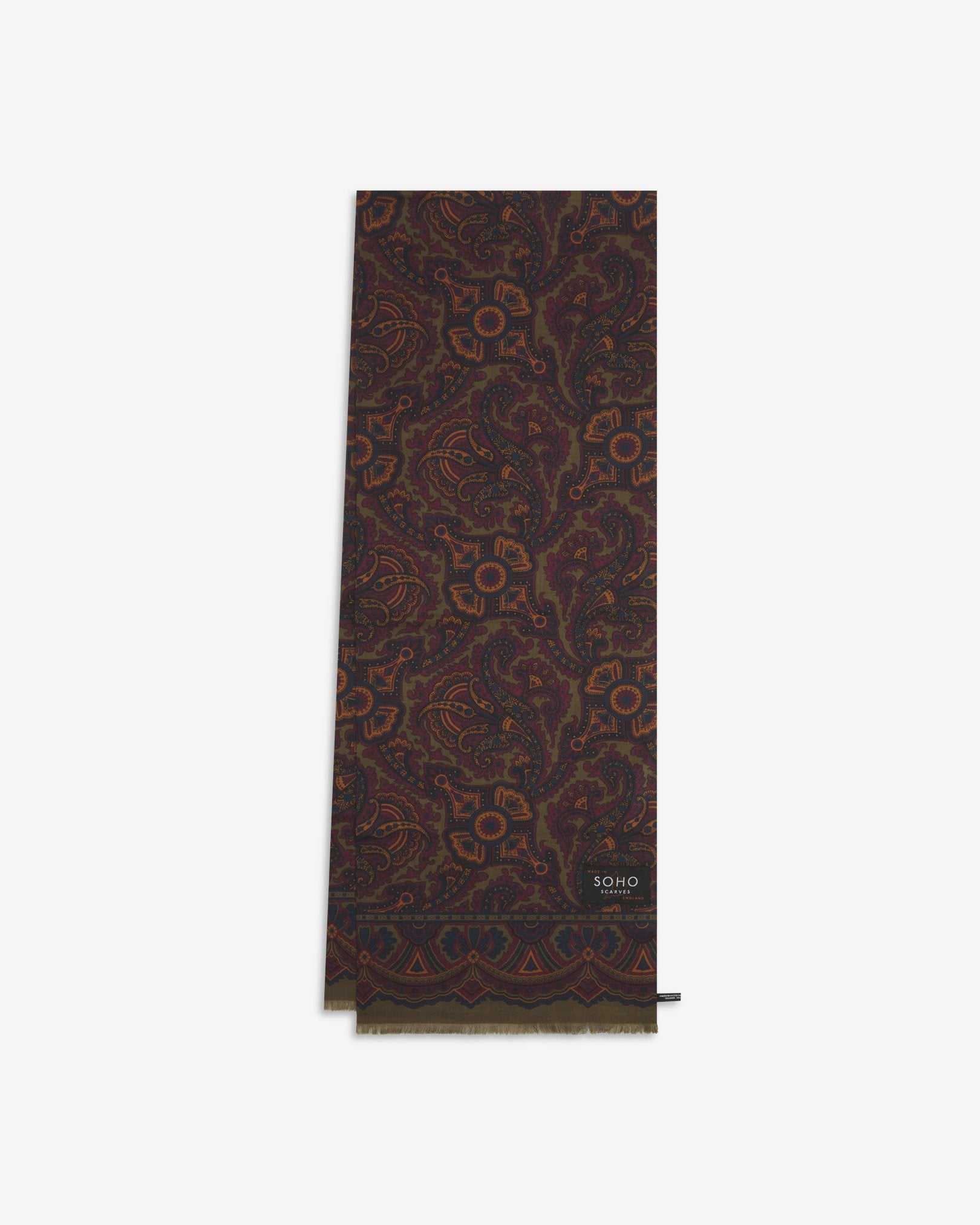 English-made silk and wool scarf arranged in a rectangular shape, displaying the repeating floral-paisley patterns in a range of autumnal colours.