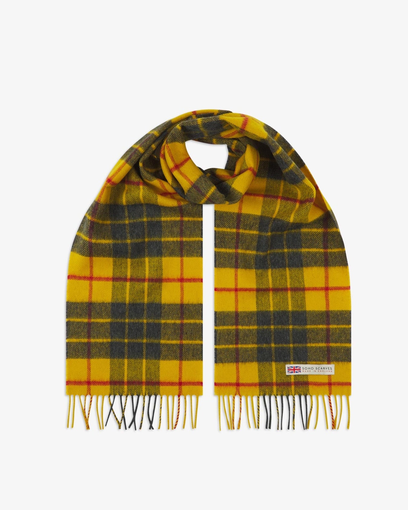 The 'Highlands' tartan in saffron scarf, looped in middle with both ends parallel showing the red and grey patterns, fringing and SOHO Scarves logo with Union Jack motif.