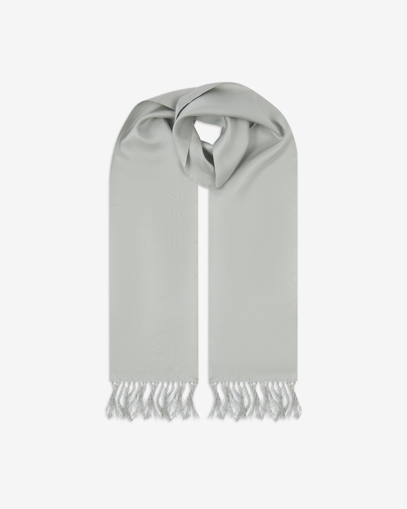 Silver silk aviator scarf from Soho Scarves. Looped with both ends parallel showing the branding label to the right and the matching 8cm long fringes.