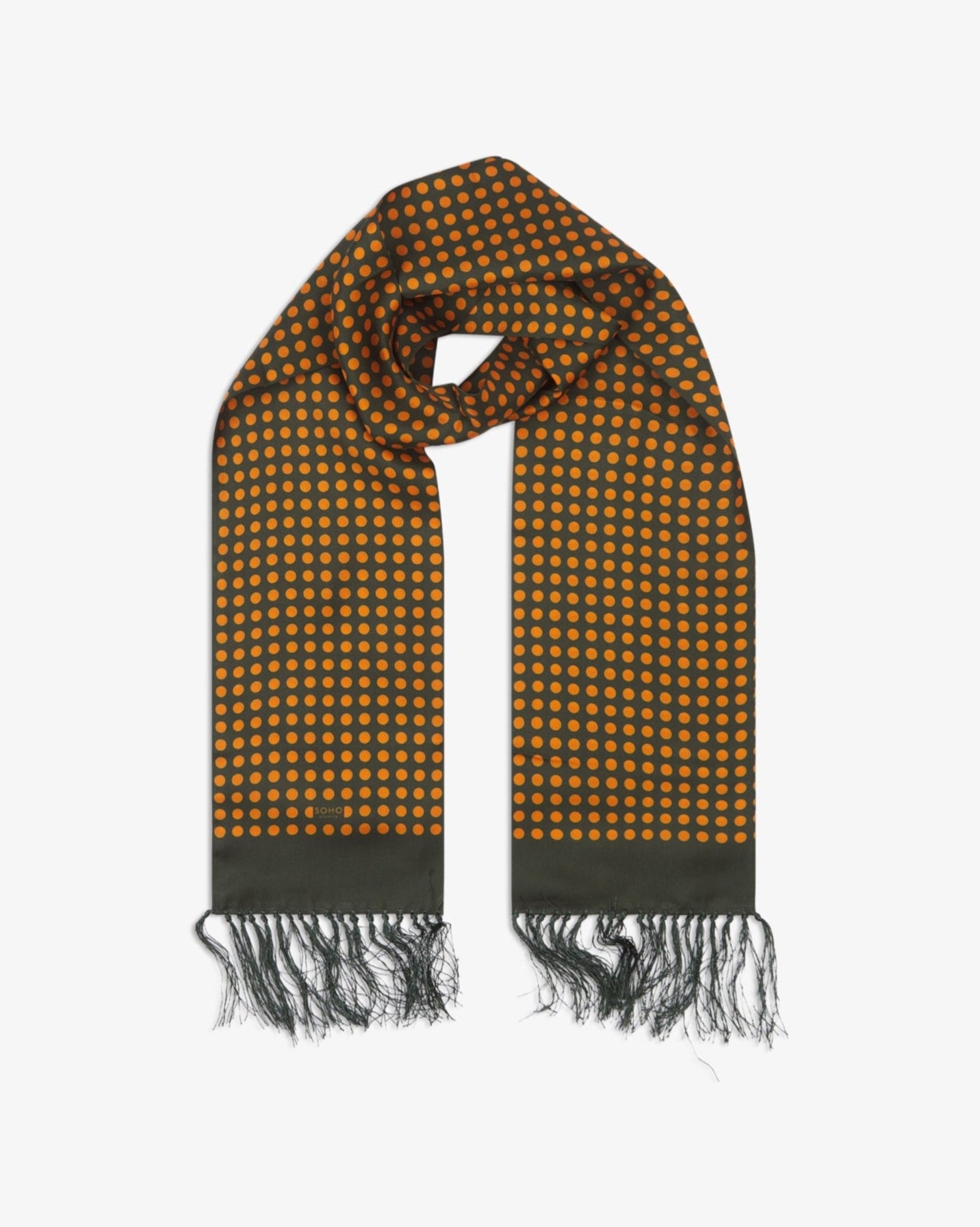 The 'Skytree Olive' silk aviator scarf looped with both ends parallel to effectively display the orange disc pattern against the sheen of the fine silk material.