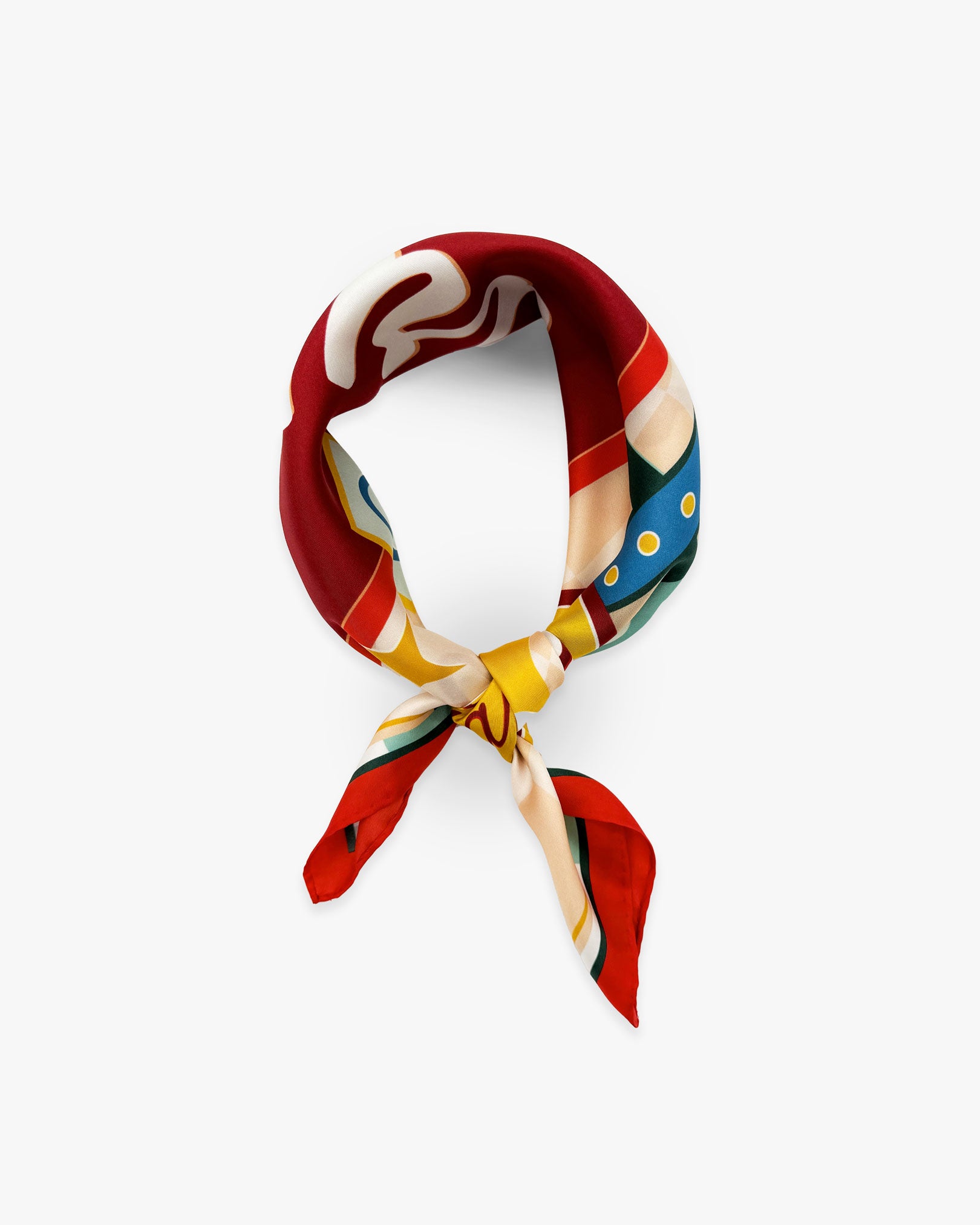 The 'Soho Sign' red silk neckerchief from SOHO Scarves knotted and looped against a white background.