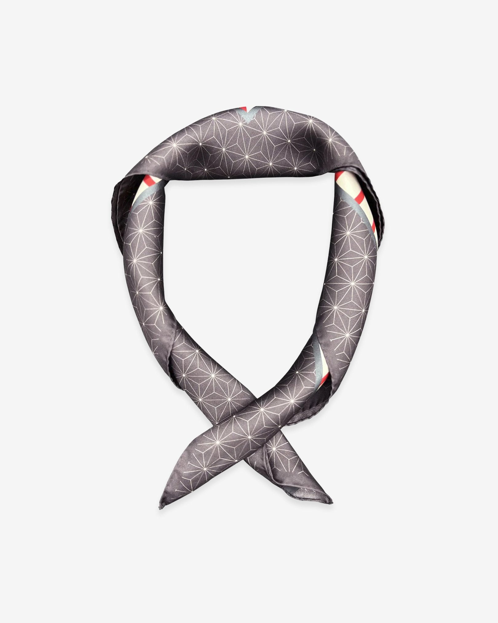 'The Sun' neckerchief twisted and curled into a loop on a white background.