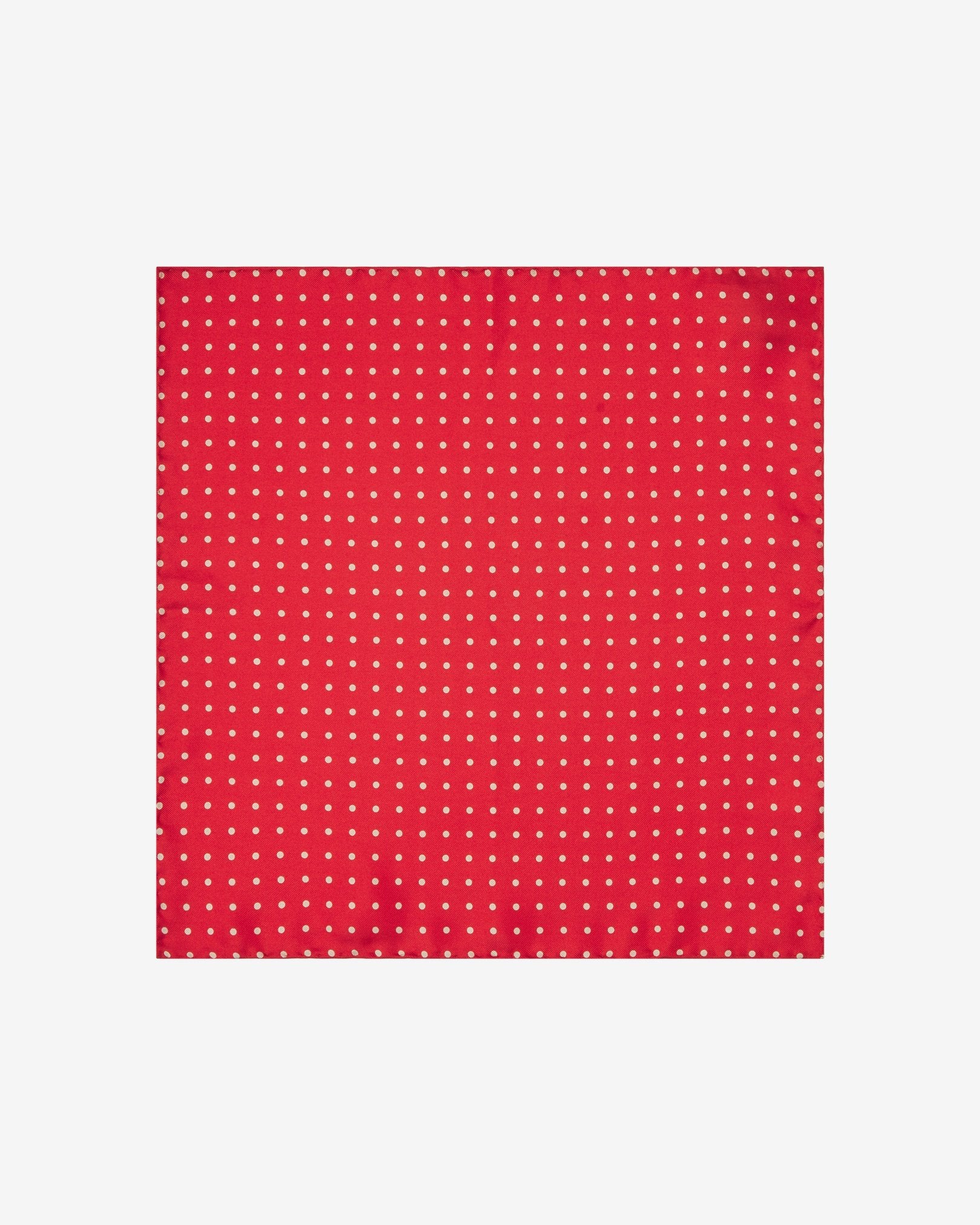 Fully unfolded 'Hastings' English silk pocket square, showing the classic linear spotty decoration against a vibrant red background.