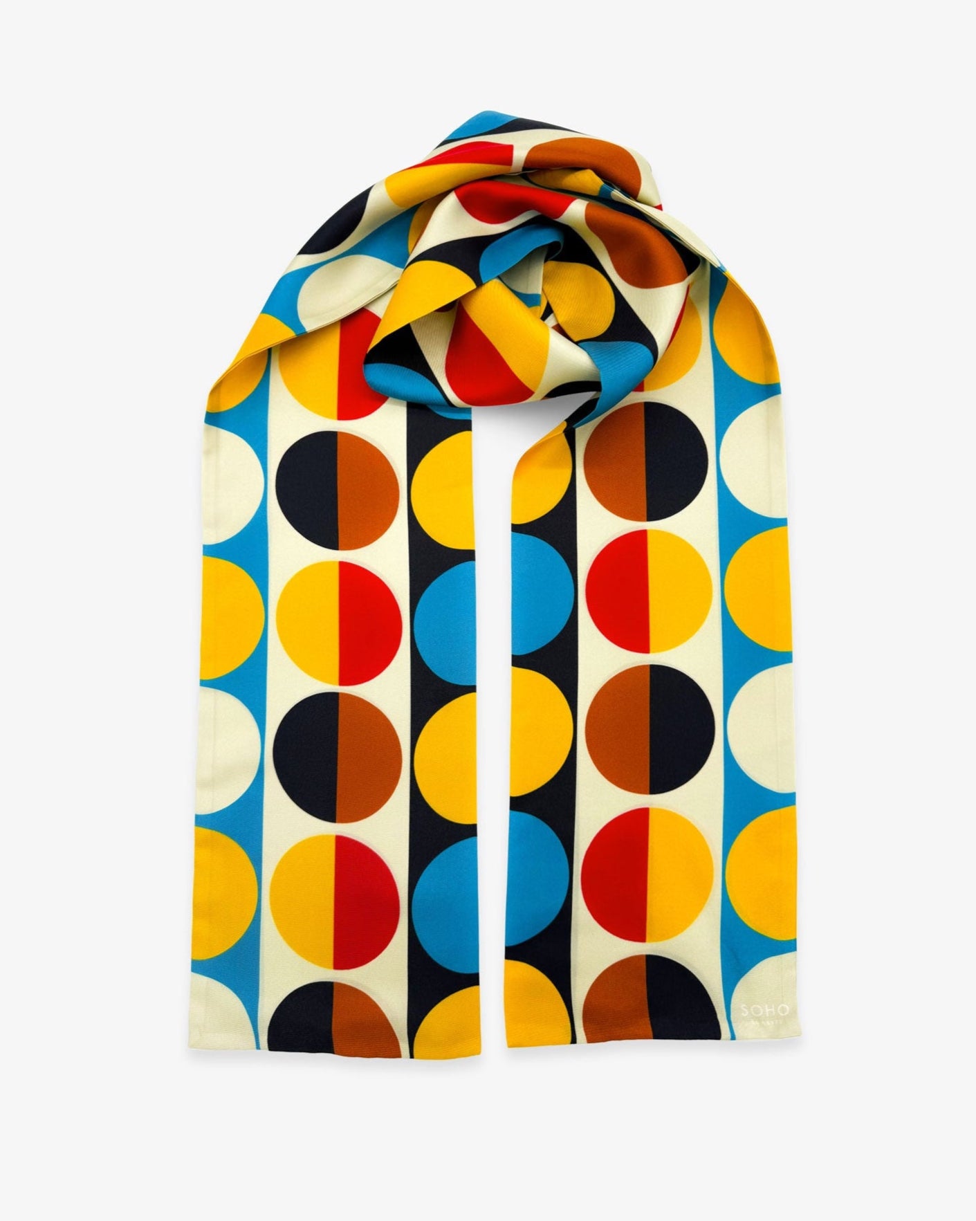 The 'Weimar' Bauhaus-inspired silk scarf looped with both ends parallel to effectively display the full repeat pattern of multicoloured semicircular discs.
