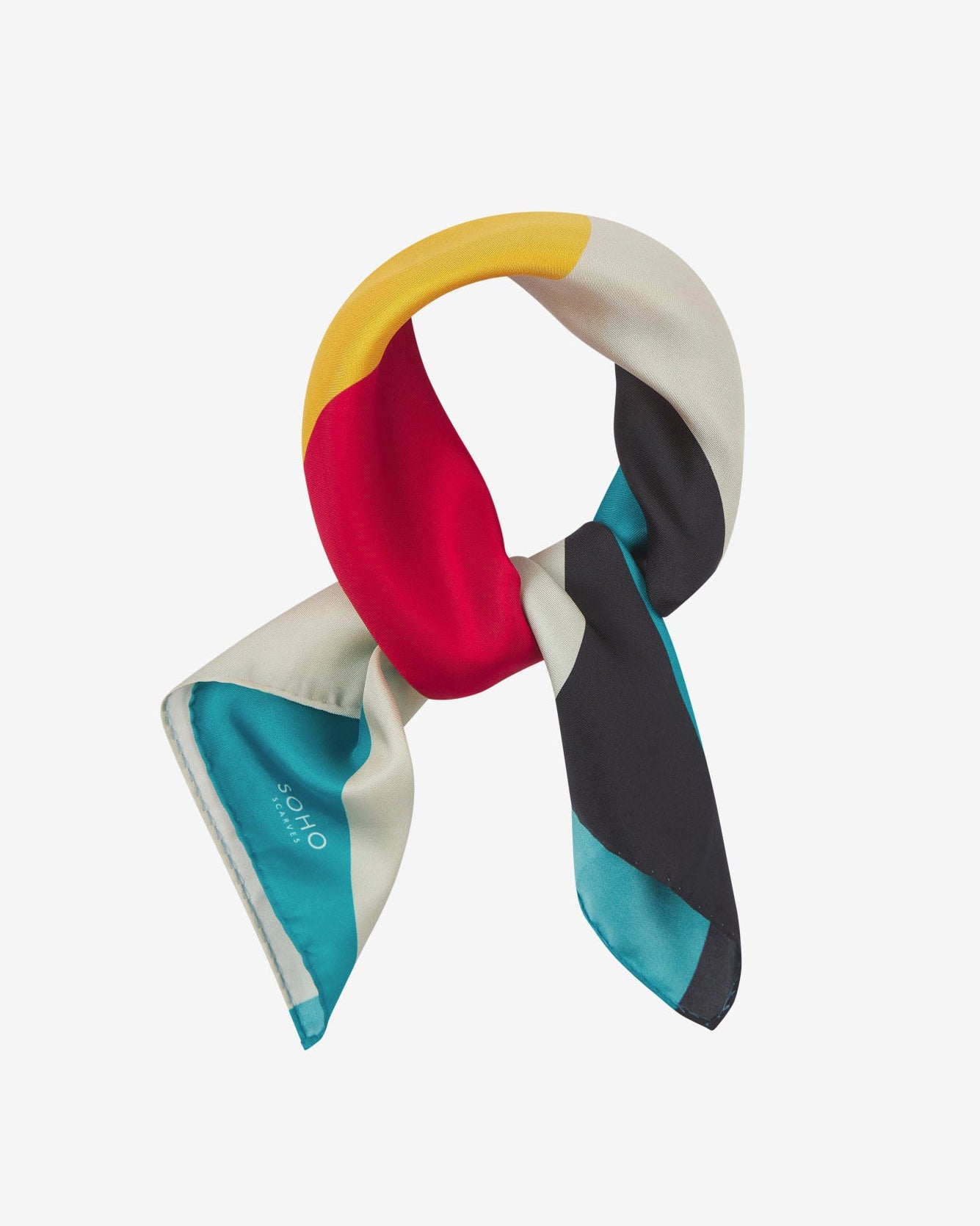 The 'Weimar' Bauhaus-inspired silk neckerchief knotted and looped against a white background.
